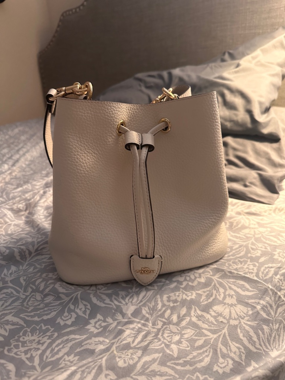 Coach Pebble Leather Drawstring Bucket Bag in Chalk